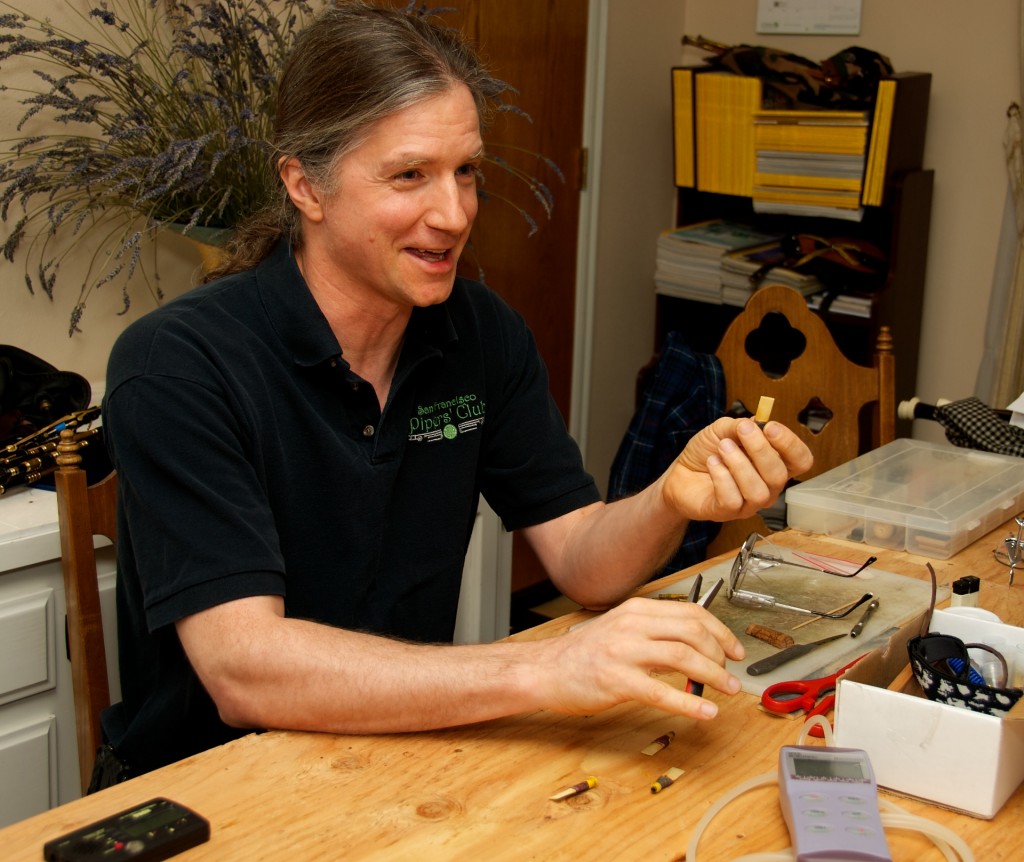 Mike Sharp demonstrating reed adjustment.