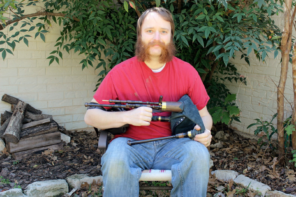 Seth Hamon with D Scottish smallpipes in African Blackwood and Burmese Blackwood